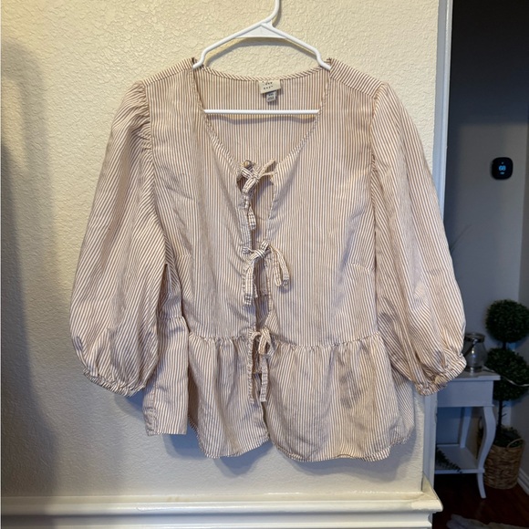 XXL Puff 3/4 Sleeve Tie-Front
Blouse - A New Day Striped - Picture 7 of 14